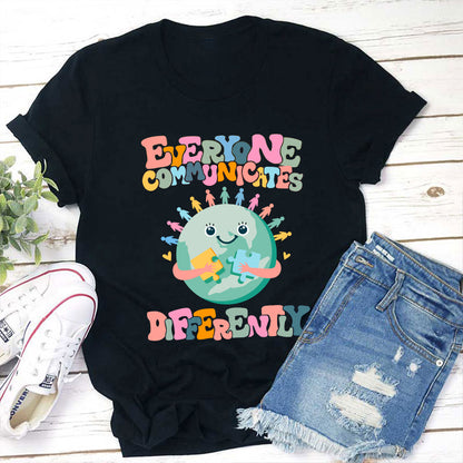 Everyone Communicates Differently Teacher T-Shirt