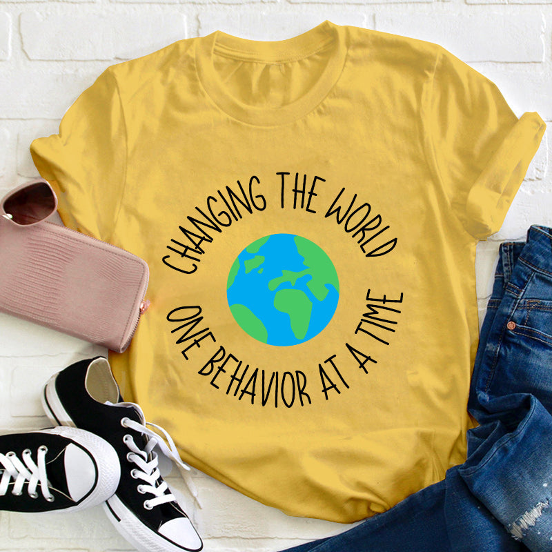 Changing The World One Behavior At A Time Teacher T-Shirt