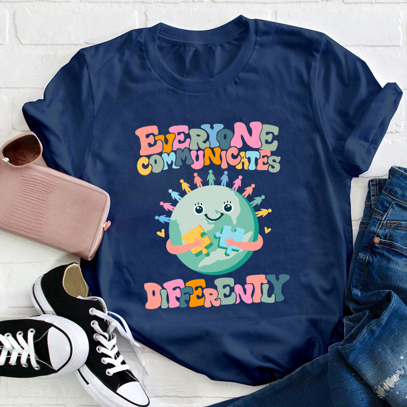 Everyone Communicates Differently Teacher T-Shirt